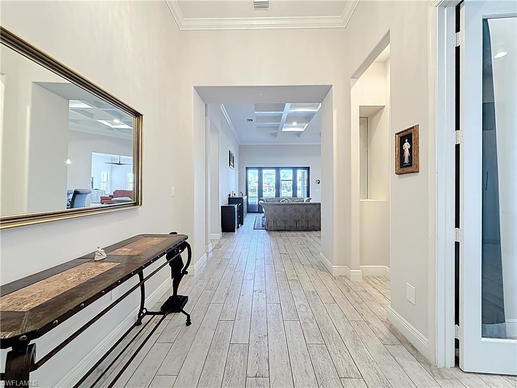 5550 Ferrari Avenue Ave Maria, FL 34142 - Photo 6 of 50 a living room with furniture and a wooden floor