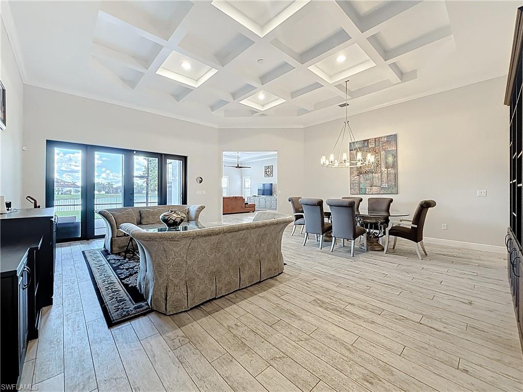 5550 Ferrari Avenue Ave Maria, FL 34142 - Photo 8 of 50 a living room with furniture and wooden floor