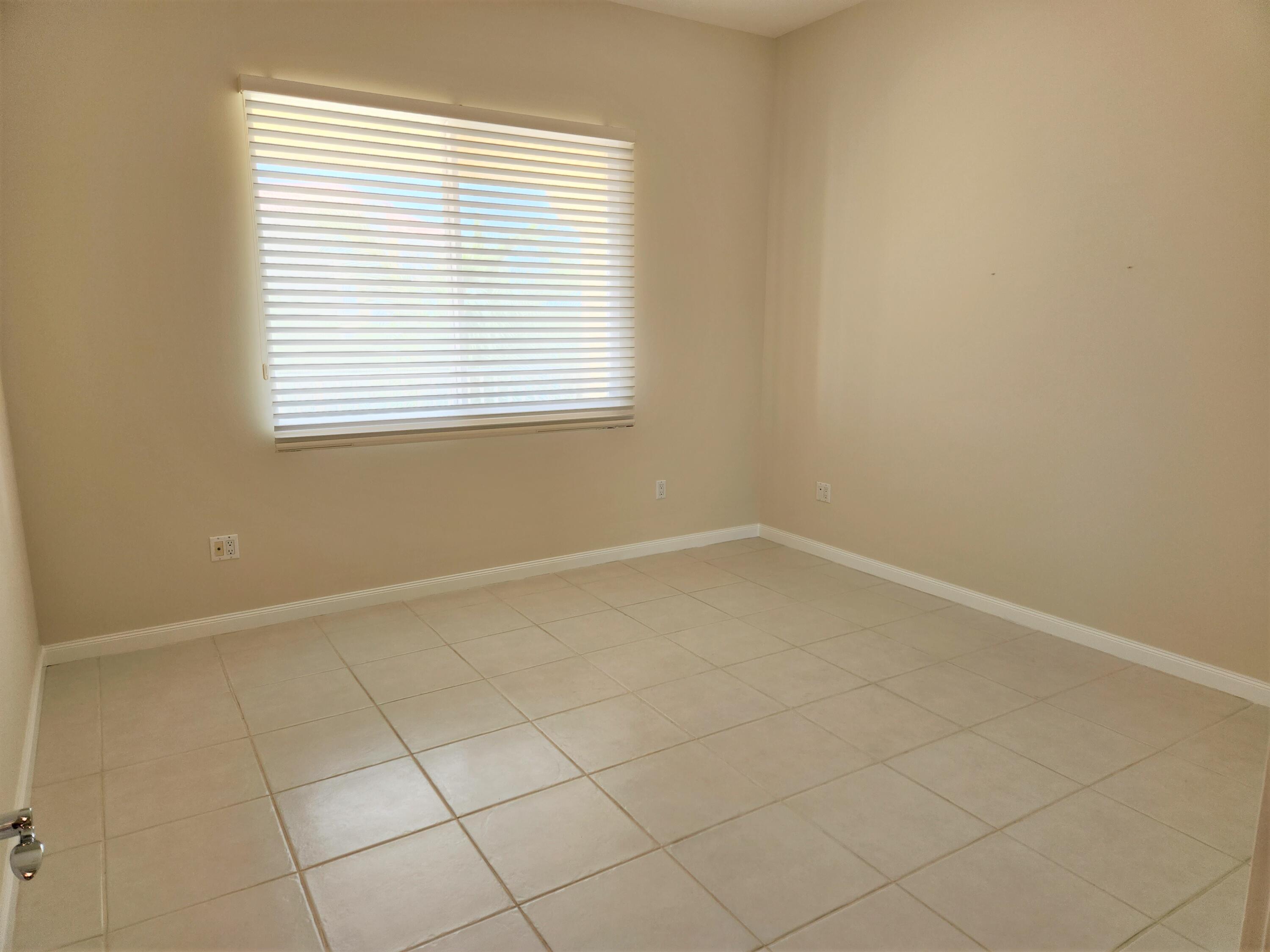 10 Harbour Isle Drive East, Unit 303 Fort Pierce, FL 34949 - Photo 15 of 31 an empty room with a window