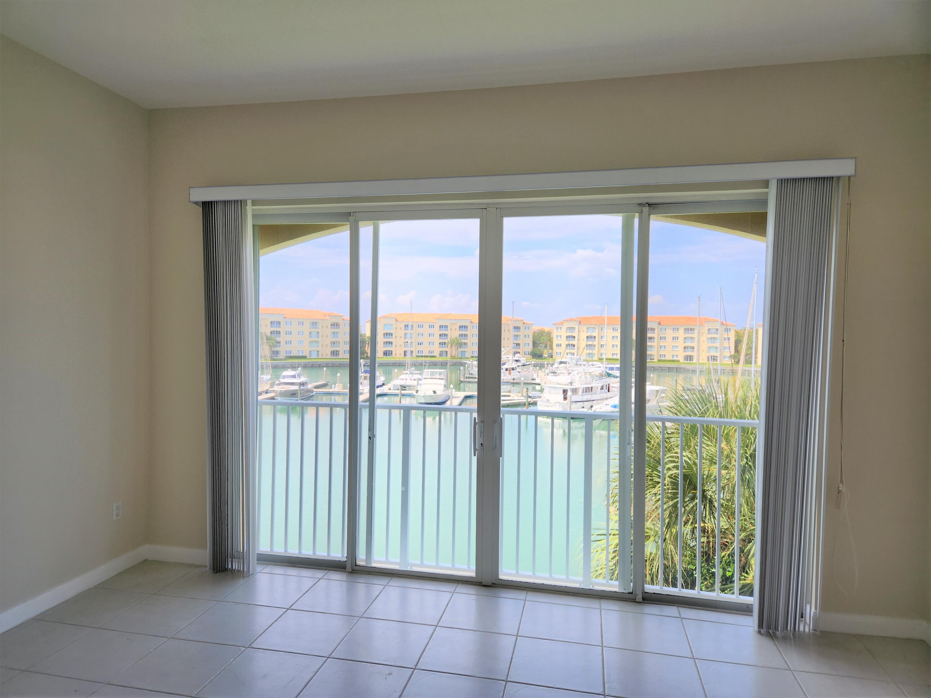 10 Harbour Isle Drive East, Unit 303 Fort Pierce, FL 34949 - Photo 7 of 31 a view of a room that has a large window