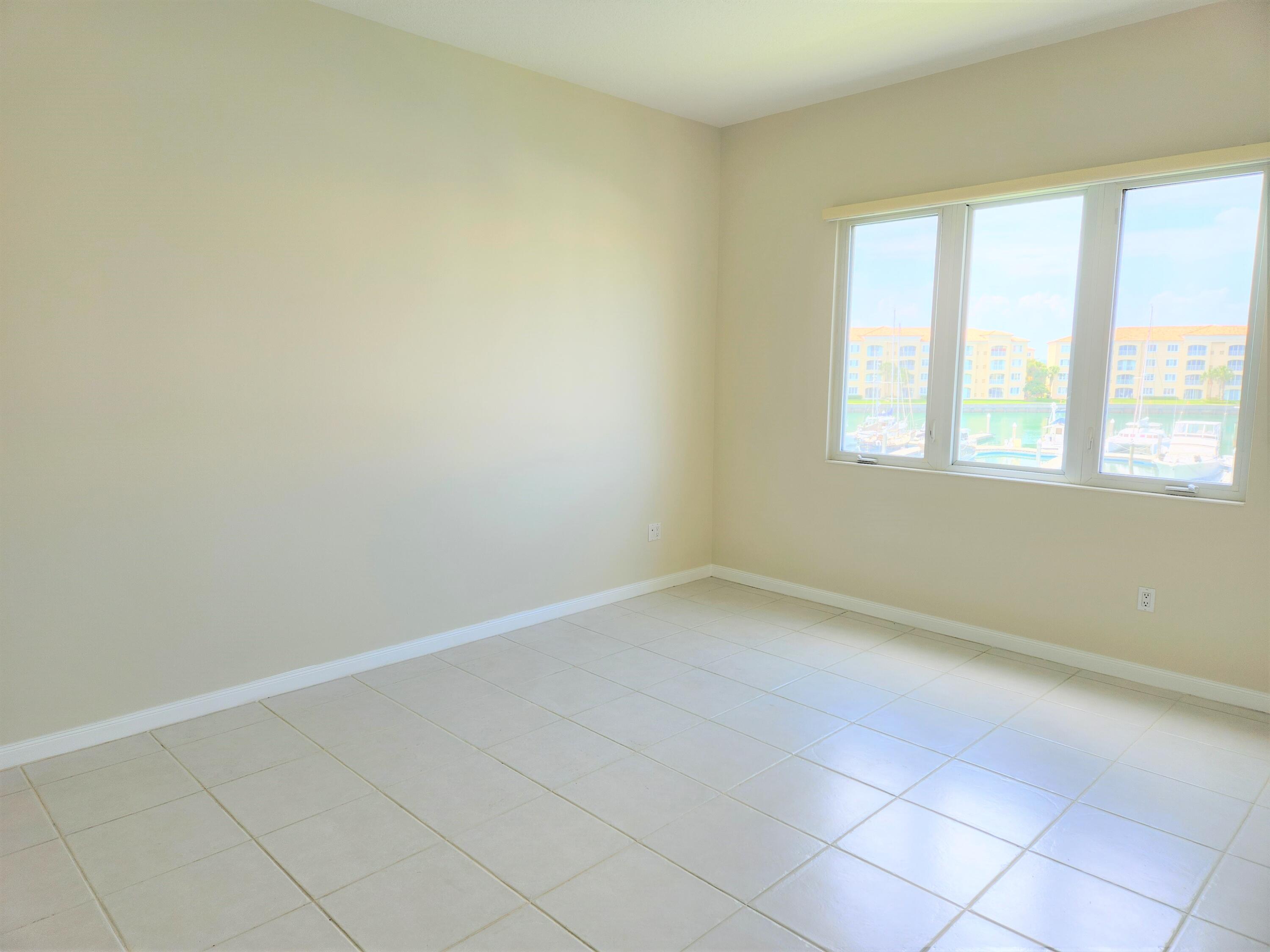 10 Harbour Isle Drive East, Unit 303 Fort Pierce, FL 34949 - Photo 9 of 31 an empty room with a window