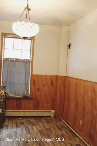 a utility room with cabinets washer and dryer