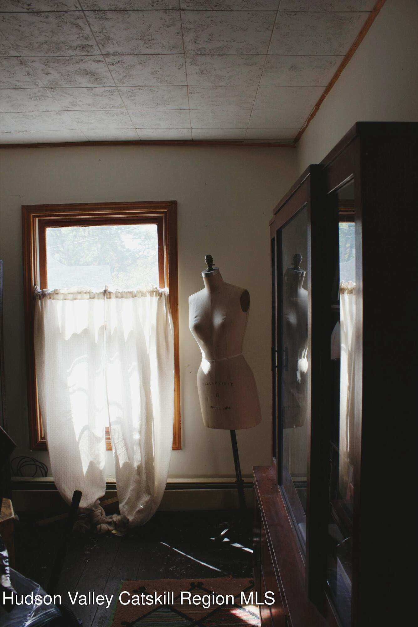564 Main Street Cairo, NY 12413 - Photo 23 of 27 a view of bathroom with a glass door and a window