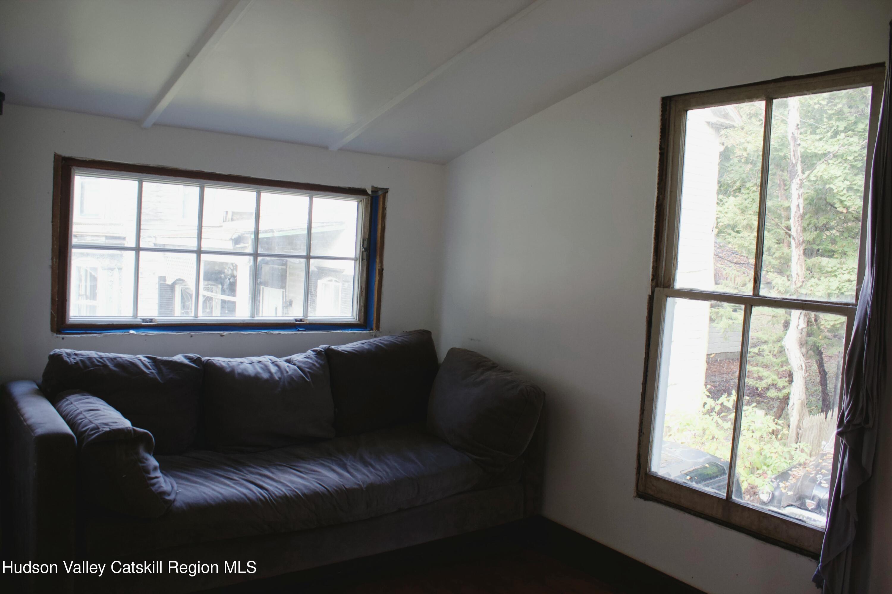 564 Main Street Cairo, NY 12413 - Photo 24 of 27 a living room with furniture and a window