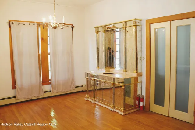 a view of a bathroom with a tub and shower