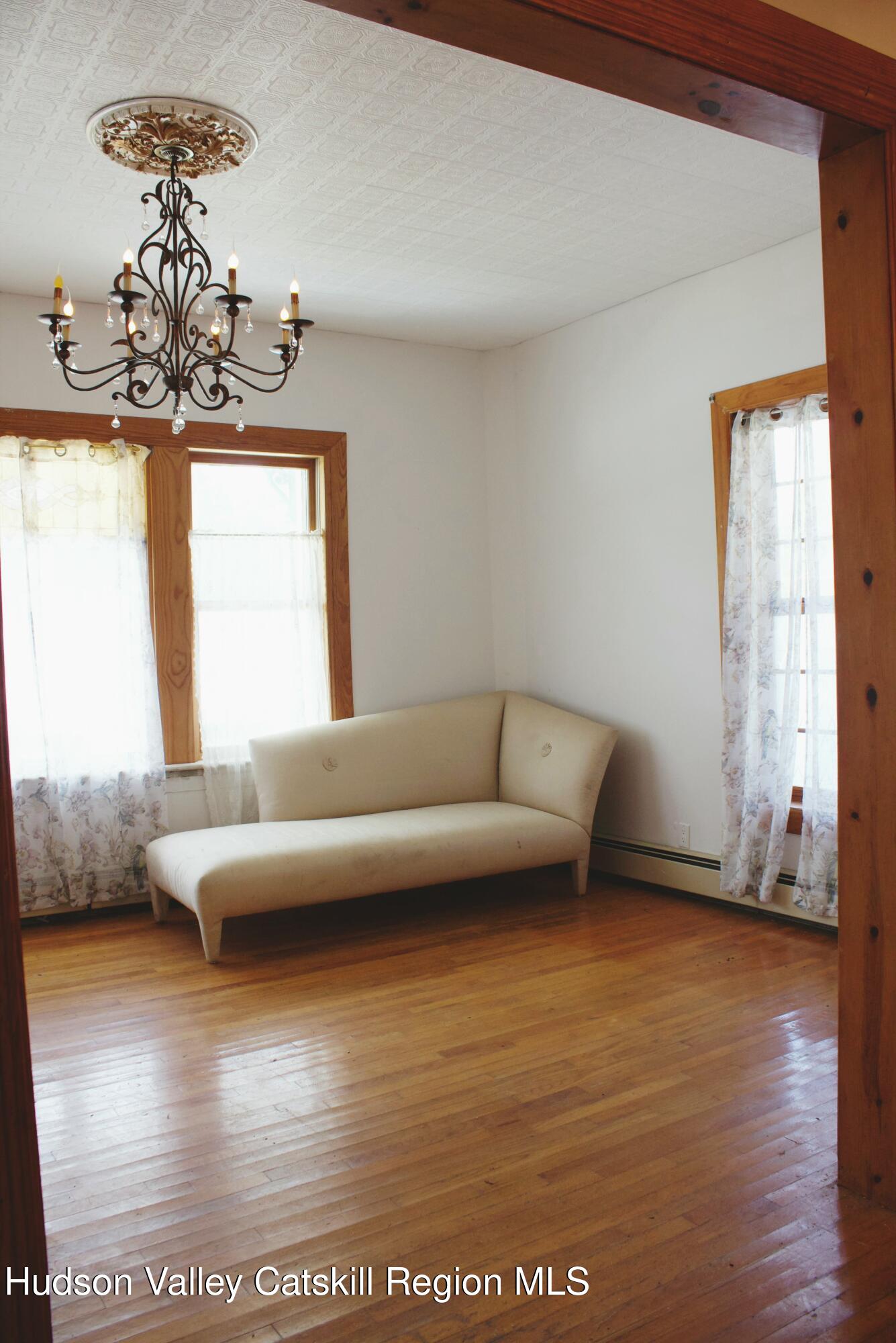 564 Main Street Cairo, NY 12413 - Photo 5 of 27 a living room with furniture and a wooden floor