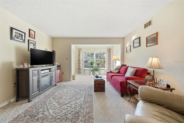 a living room with furniture and a couch