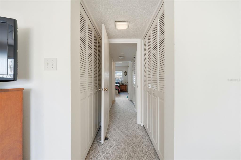 110 North Tremain Street, Unit 109 Mount Dora, FL 32757 - Photo 24 of 45 a view of a hallway with closet