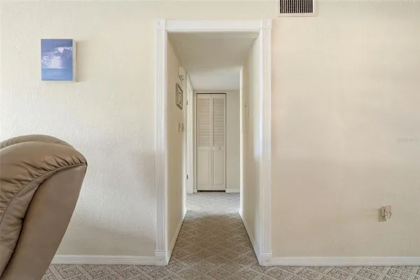 an aerial view of a house with a ocean view