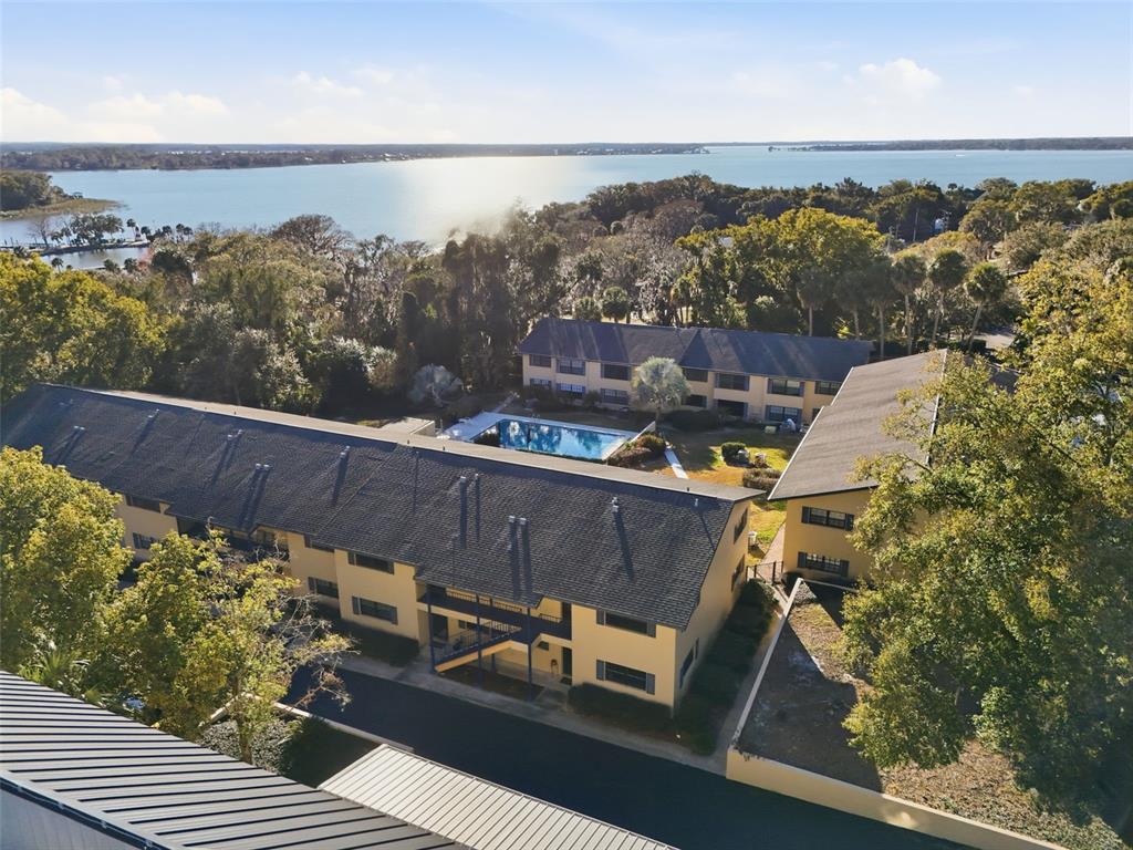 110 North Tremain Street, Unit 109 Mount Dora, FL 32757 - Photo 32 of 45 an aerial view of a house with a ocean view