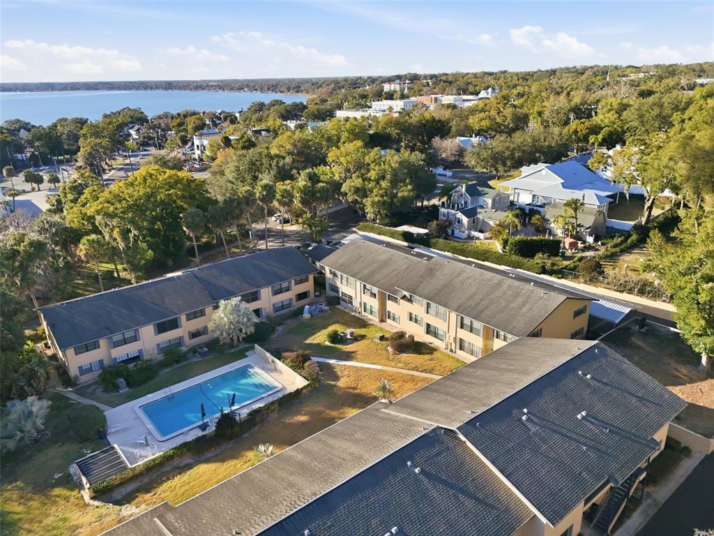 110 North Tremain Street, Unit 109 Mount Dora, FL 32757 - Photo 37 of 45 an aerial view of a house with a swimming pool