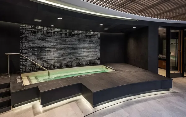 a view of swimming pool with outdoor seating