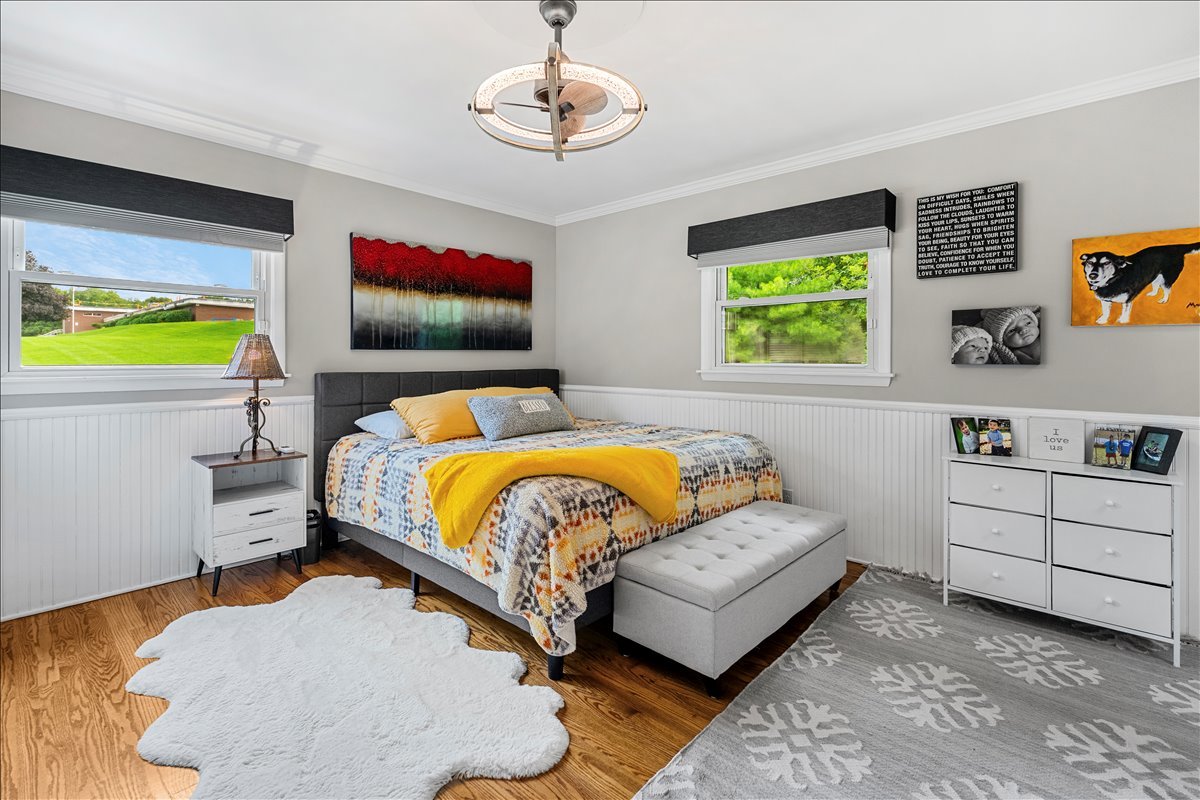 30 South Wulff Street Cary, IL 60013 - Photo 14 of 39 a bed room with a bed and a couch