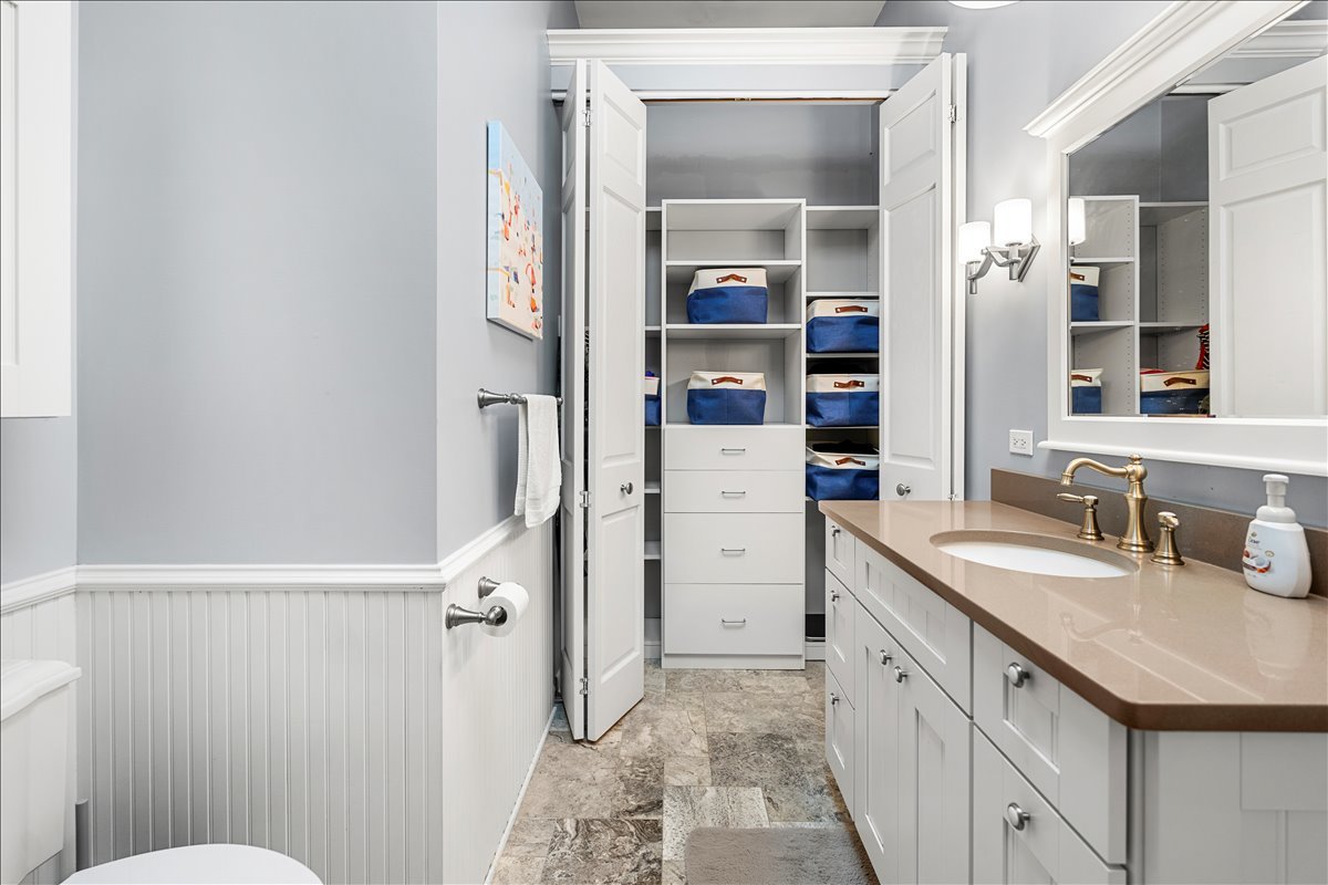 30 South Wulff Street Cary, IL 60013 - Photo 17 of 39 a bathroom with a granite countertop sink toilet and shower