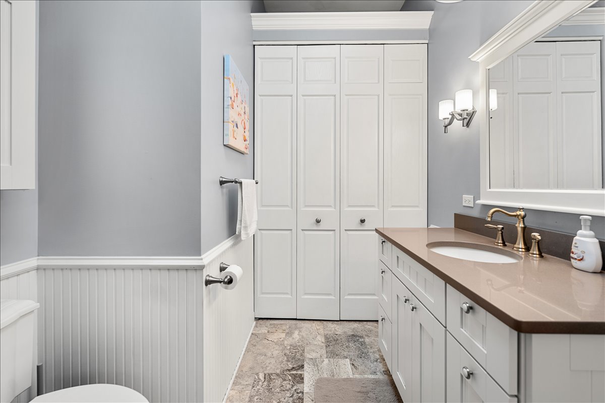 30 South Wulff Street Cary, IL 60013 - Photo 22 of 39 a bathroom with a sink a toilet and shower