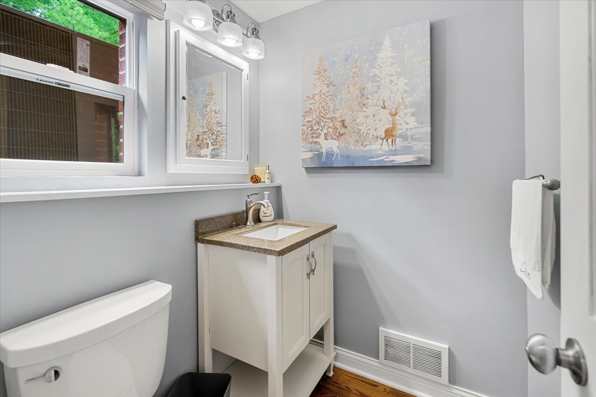 30 South Wulff Street Cary, IL 60013 - Photo 25 of 39 a view of bathroom with a sink and a mirror