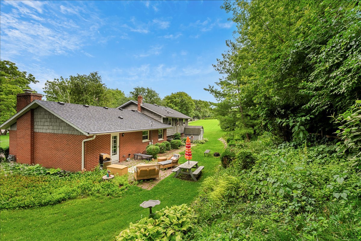 30 South Wulff Street Cary, IL 60013 - Photo 28 of 39 a aerial view of a house with swimming pool and garden