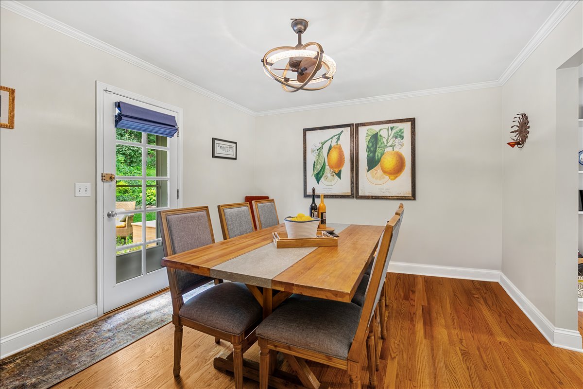 30 South Wulff Street Cary, IL 60013 - Photo 6 of 39 a view of a dining room with furniture a rug and wooden floor