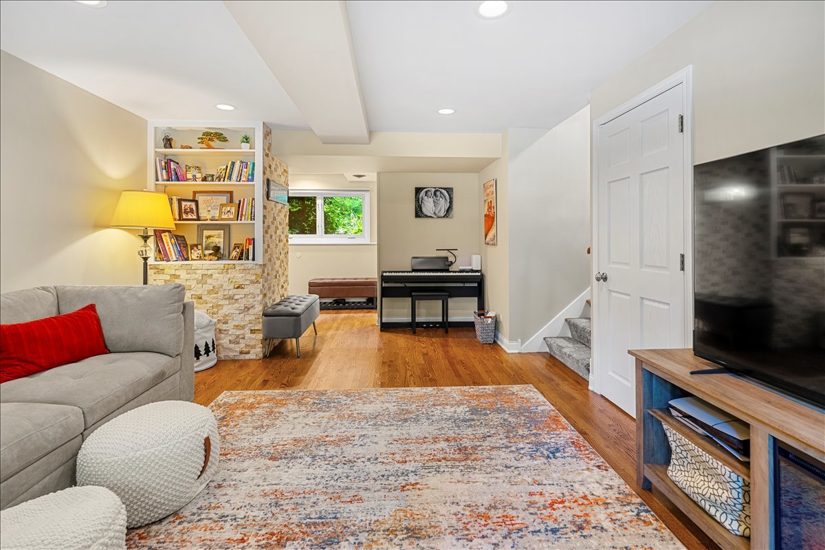 30 South Wulff Street Cary, IL 60013 - Photo 9 of 39 a living room with furniture and a flat screen tv
