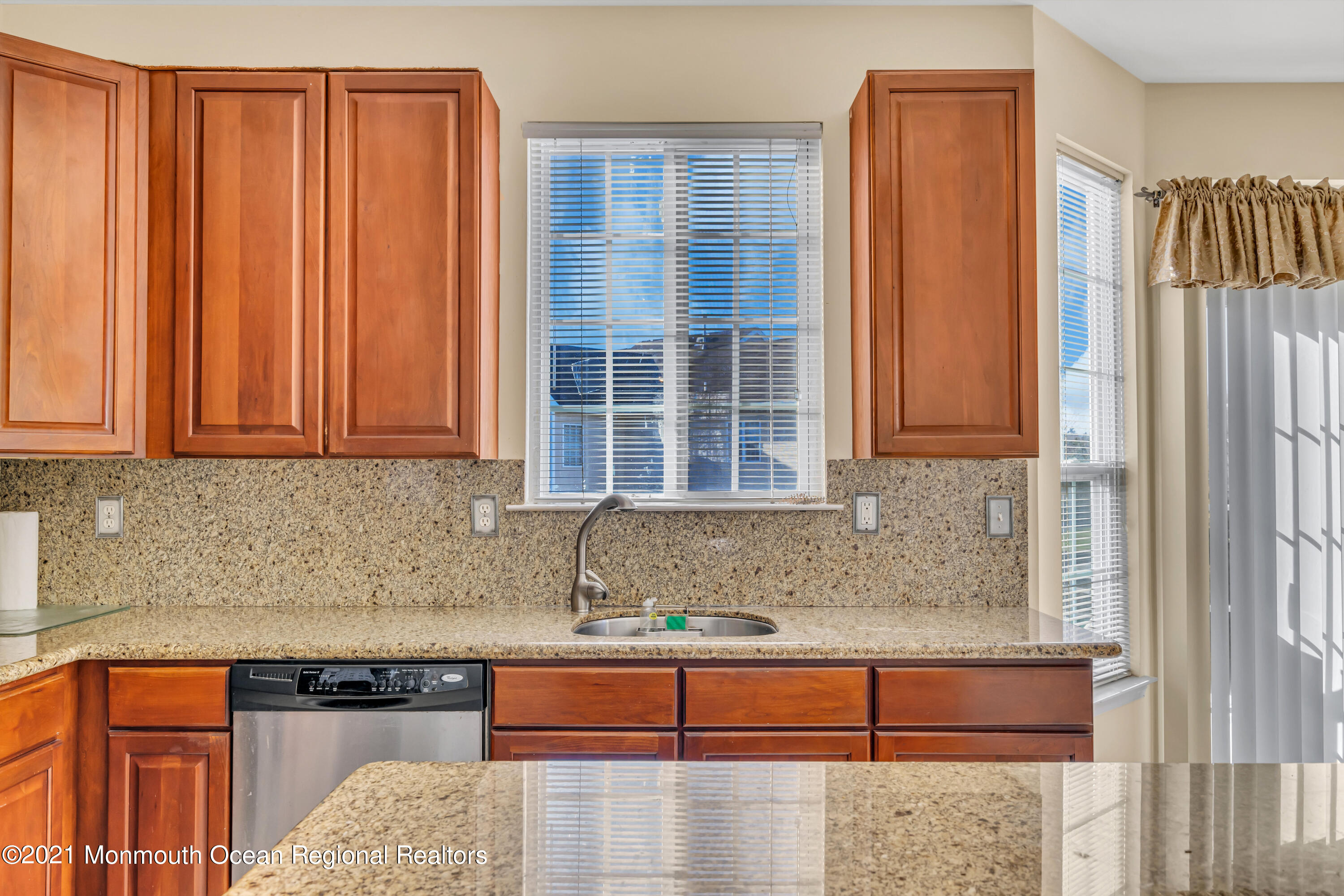 20 Lancaster Way Jackson, NJ 08527 - Photo 16 of 58 a kitchen with stainless steel appliances granite countertop a refrigerator and a sink