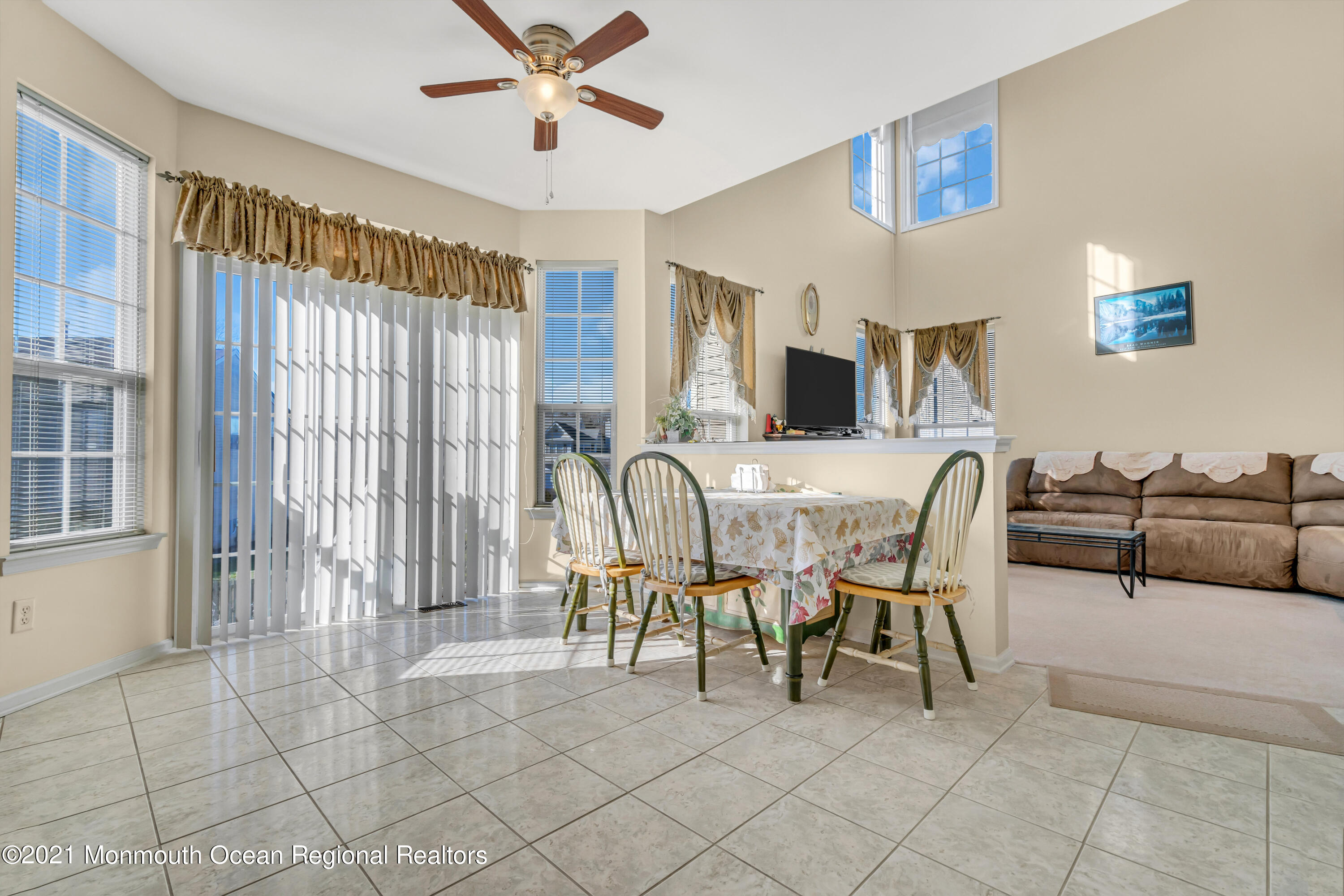 20 Lancaster Way Jackson, NJ 08527 - Photo 23 of 58 a dining room with furniture and a large window