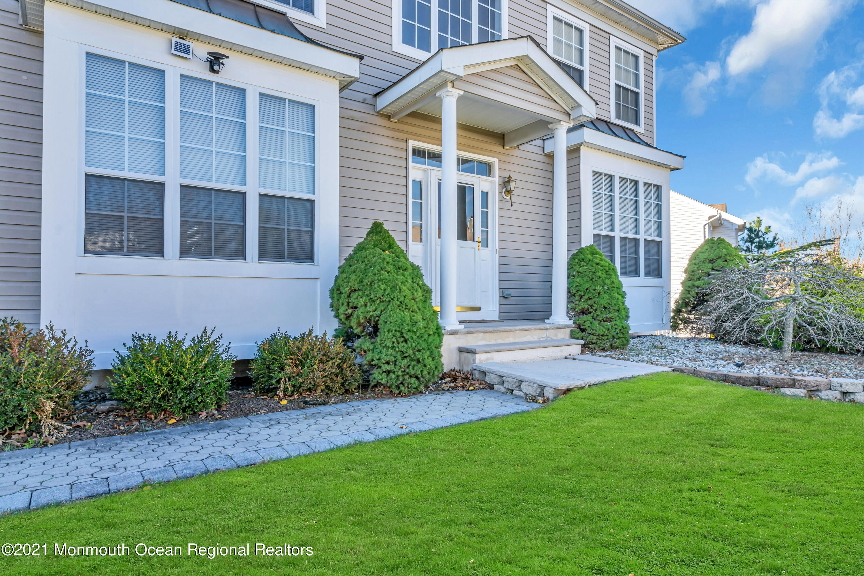 20 Lancaster Way Jackson, NJ 08527 - Photo 3 of 58 a view of a house with a garden and plants