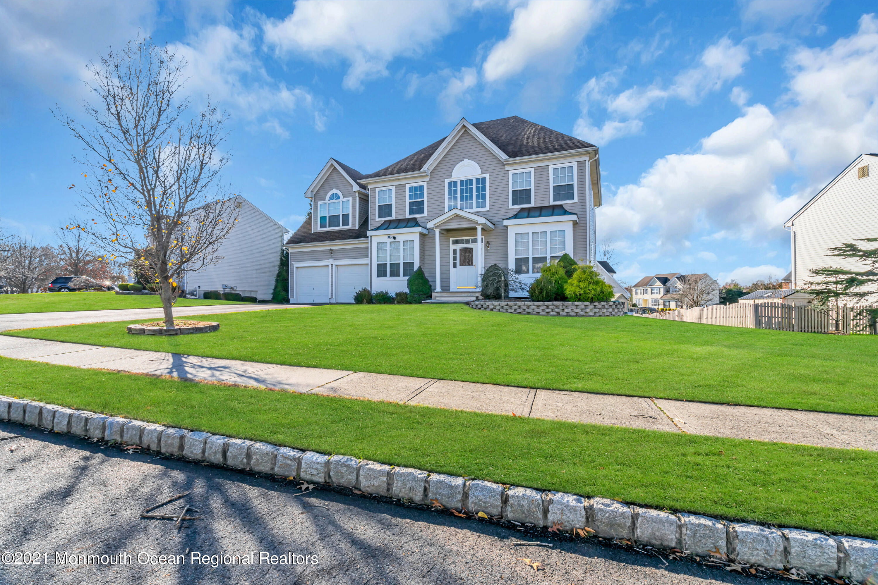 20 Lancaster Way Jackson, NJ 08527 - Photo 4 of 58 a view of a big house with a big yard and large trees