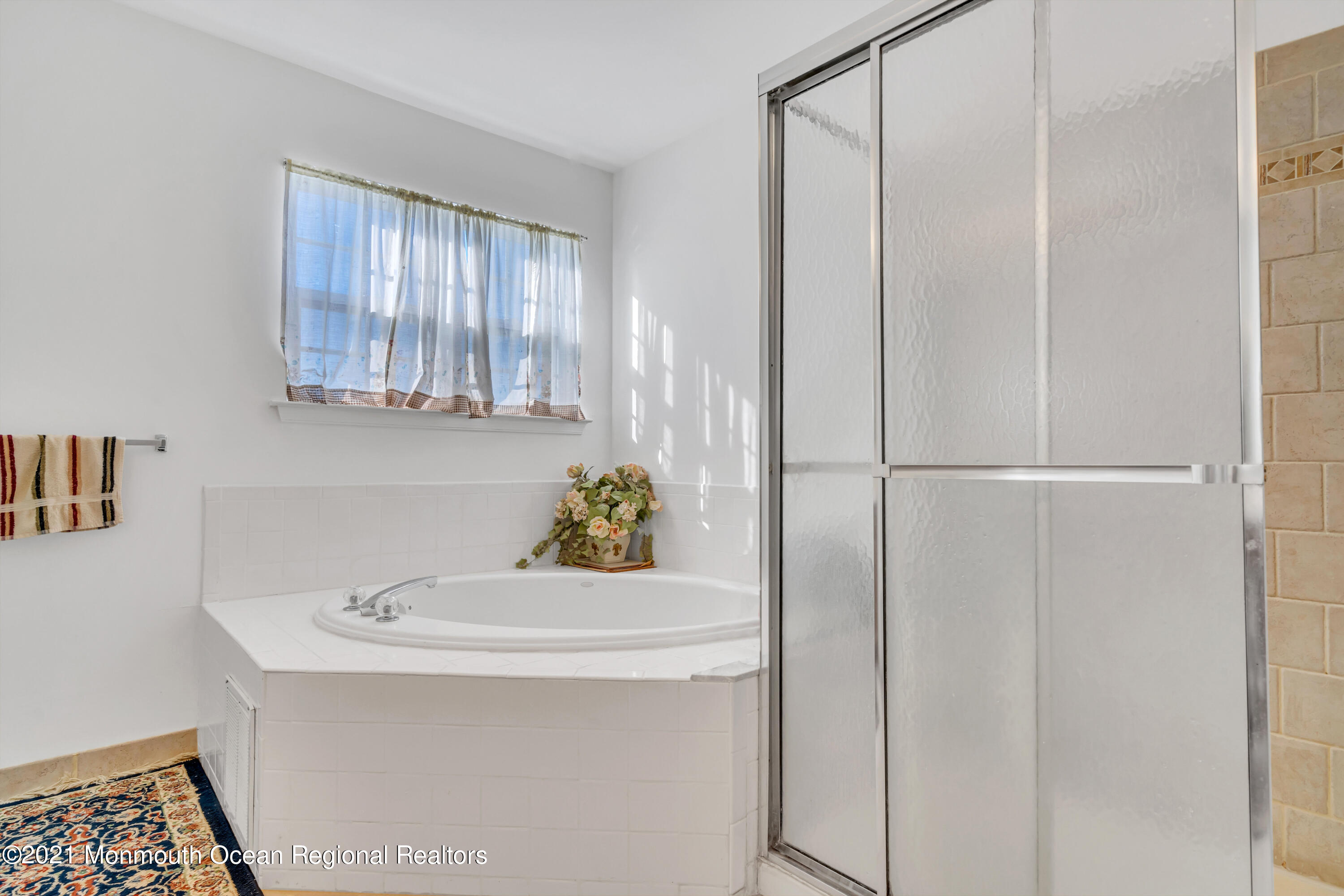 20 Lancaster Way Jackson, NJ 08527 - Photo 45 of 58 a bathroom with a sink and a cabinet