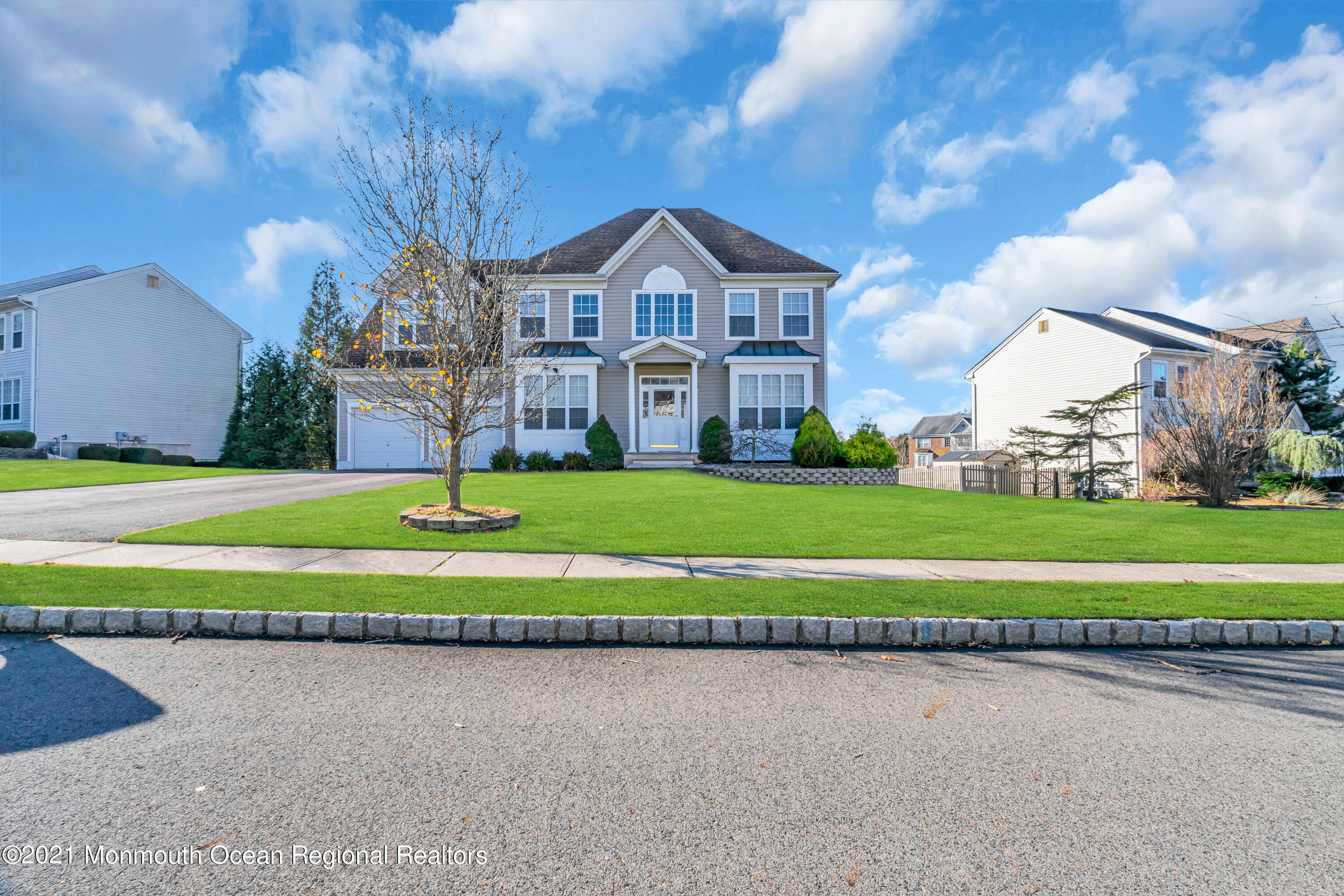 20 Lancaster Way Jackson, NJ 08527 - Photo 5 of 58 a view of a house with a big yard and large trees