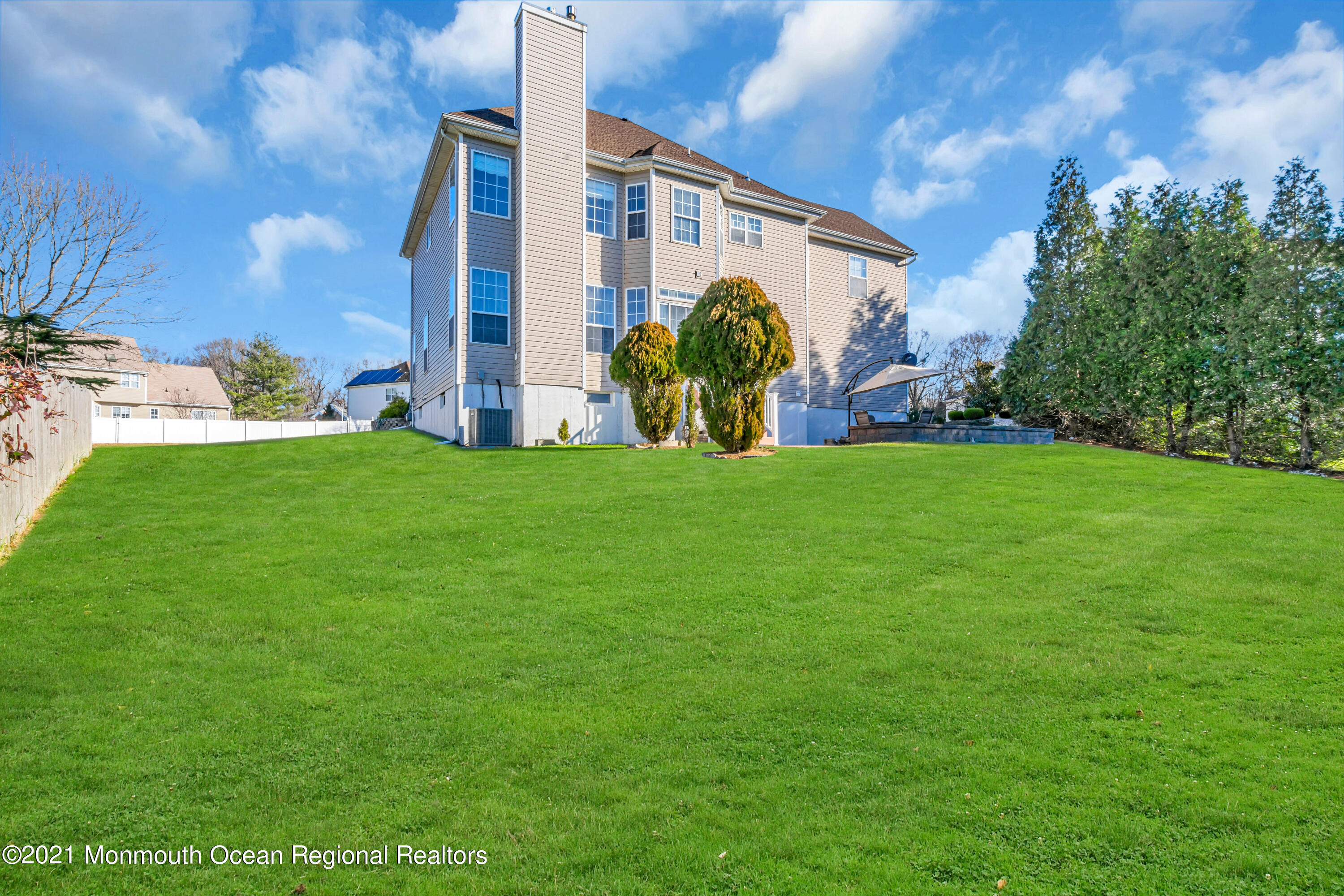 20 Lancaster Way Jackson, NJ 08527 - Photo 51 of 58 a view of a back yard of the house