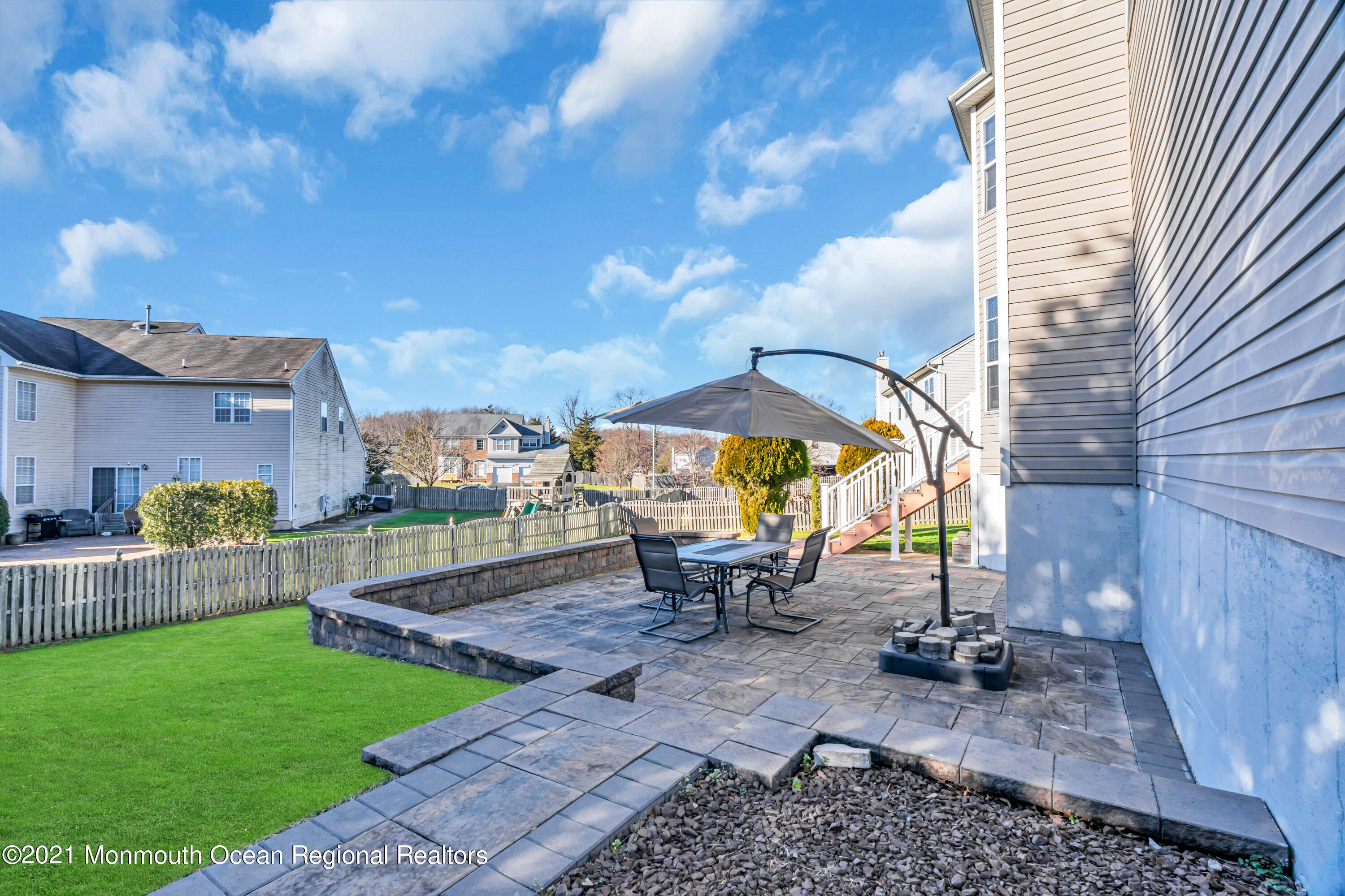 20 Lancaster Way Jackson, NJ 08527 - Photo 54 of 58 a view of a house with backyard porch and sitting area