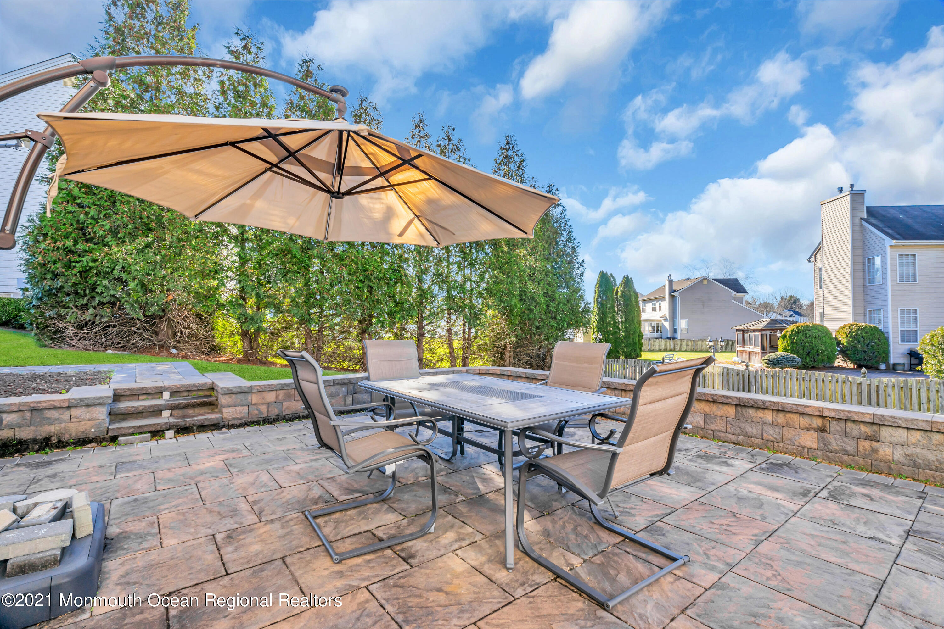 20 Lancaster Way Jackson, NJ 08527 - Photo 56 of 58 a patio with a patio table and chairs