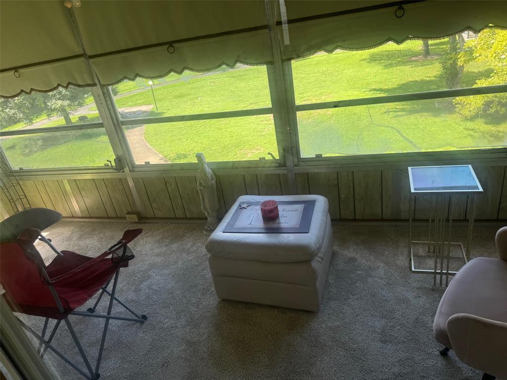 1801 Northwest 75th Avenue, Unit 306 Plantation, FL 33313 - Photo 25 of 27 a balcony with table and chairs