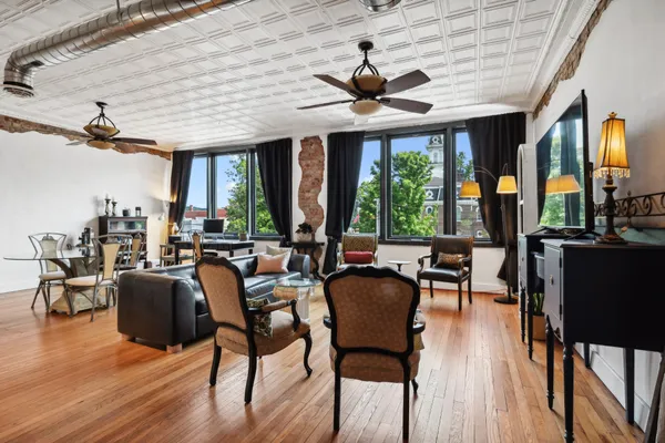 a view of a dining room with furniture window and outside view