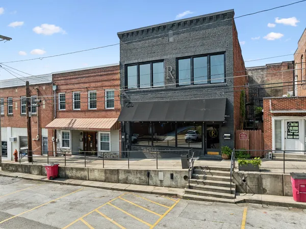 a view of a building with a porch