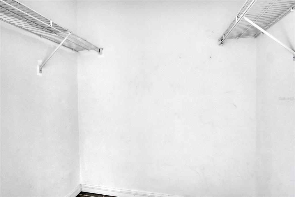 3514 Dairy Road, Unit 10 Titusville, FL 32796 - Photo 28 of 44 a view of small space with racks on the wall