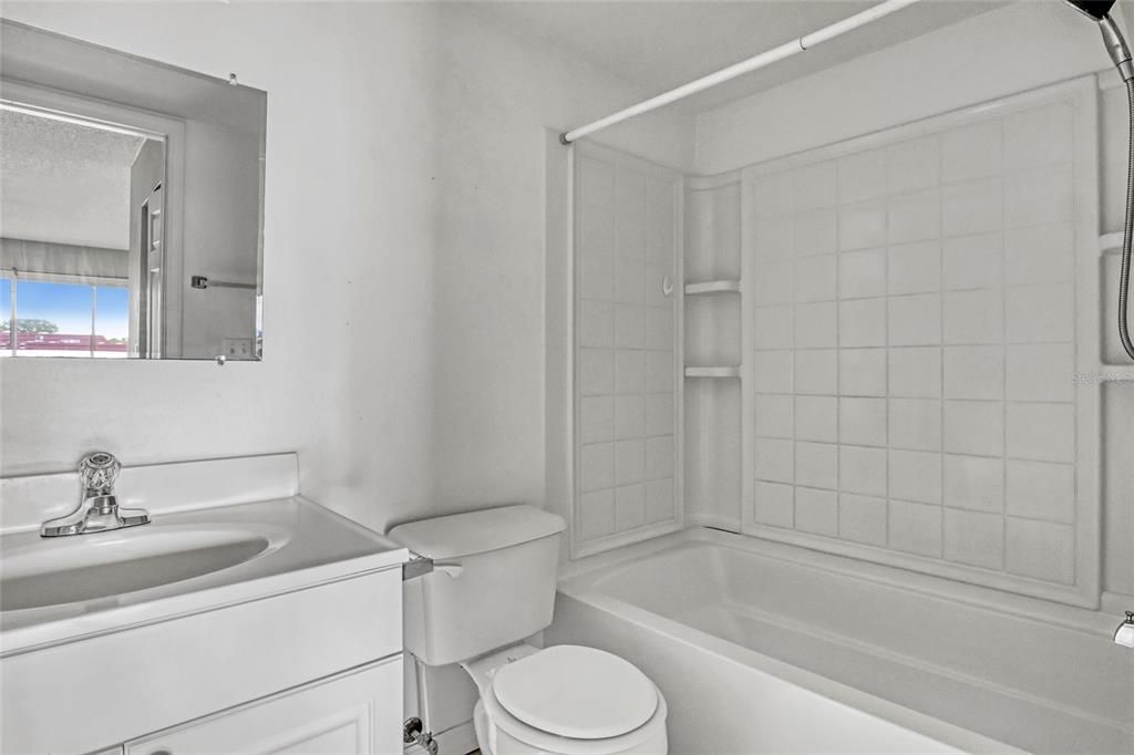 3514 Dairy Road, Unit 10 Titusville, FL 32796 - Photo 29 of 44 a bathroom with a sink toilet and shower