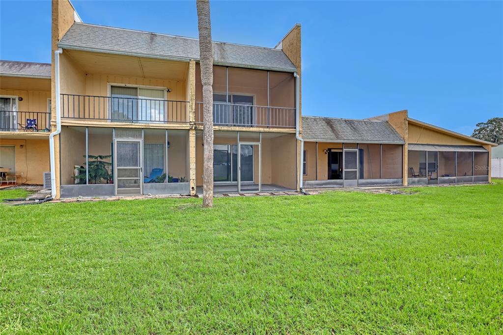 3514 Dairy Road, Unit 10 Titusville, FL 32796 - Photo 43 of 44 a view of a house with yard and front view of a house