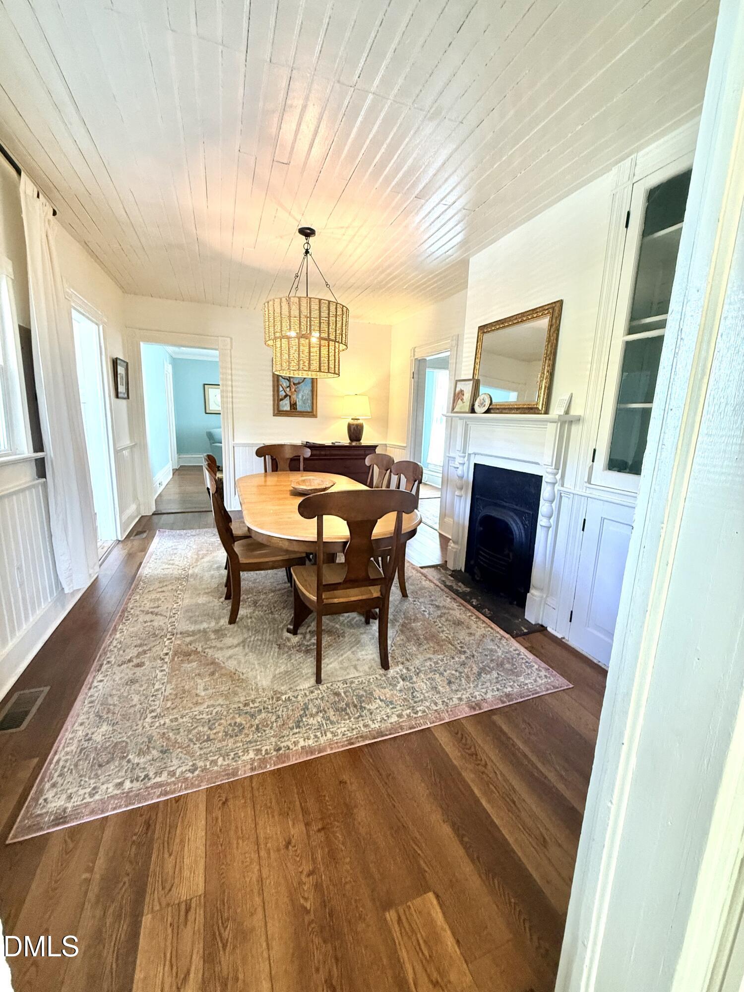 190 Broad Street Milton, NC 27305 - Photo 13 of 62 a living room with furniture and a fireplace