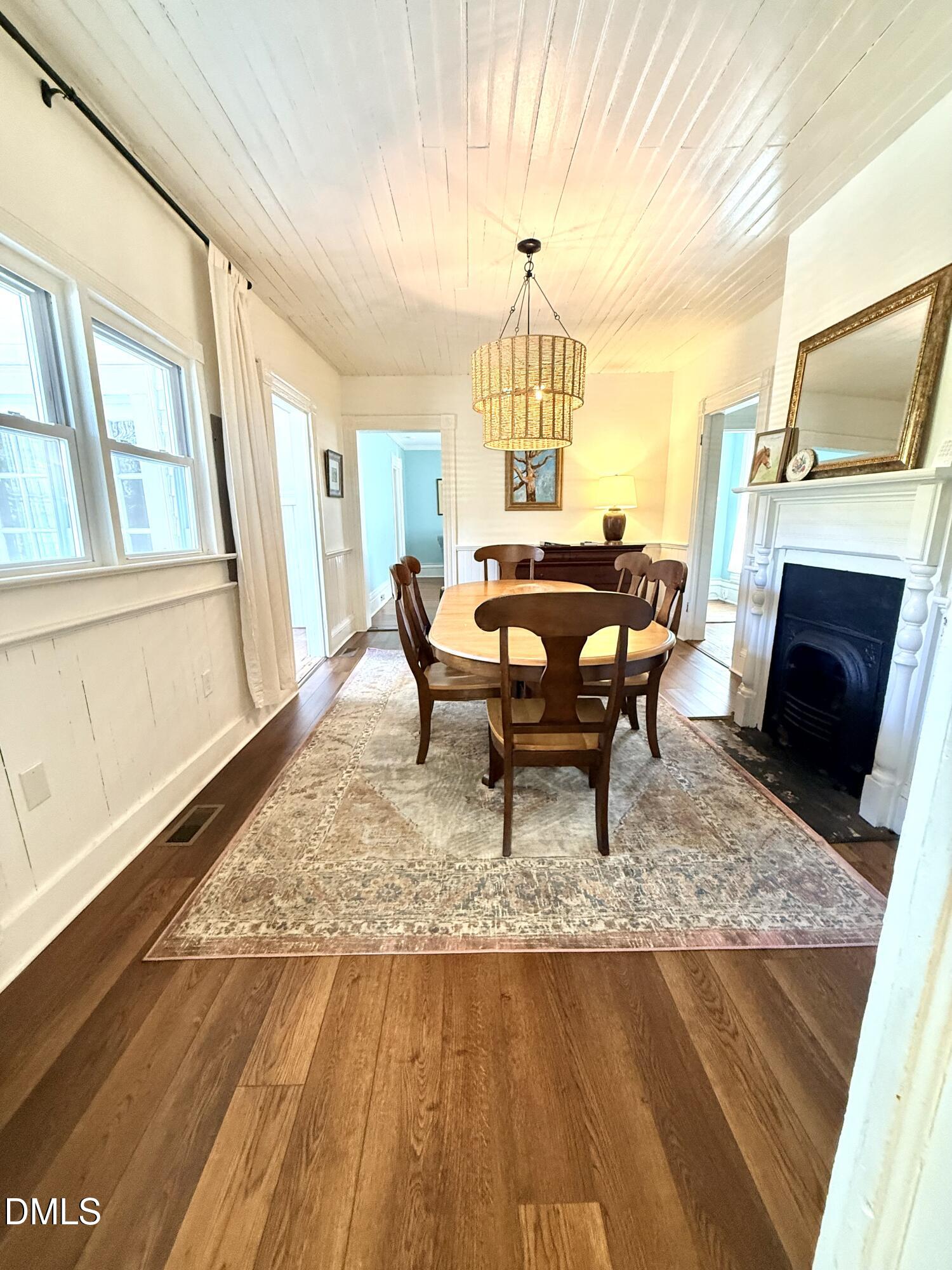 190 Broad Street Milton, NC 27305 - Photo 14 of 62 a living room with furniture and a fireplace