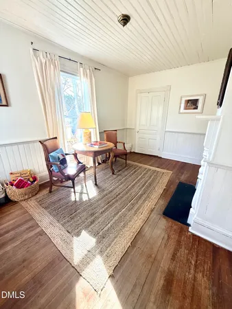 a bedroom with a bed and a fireplace