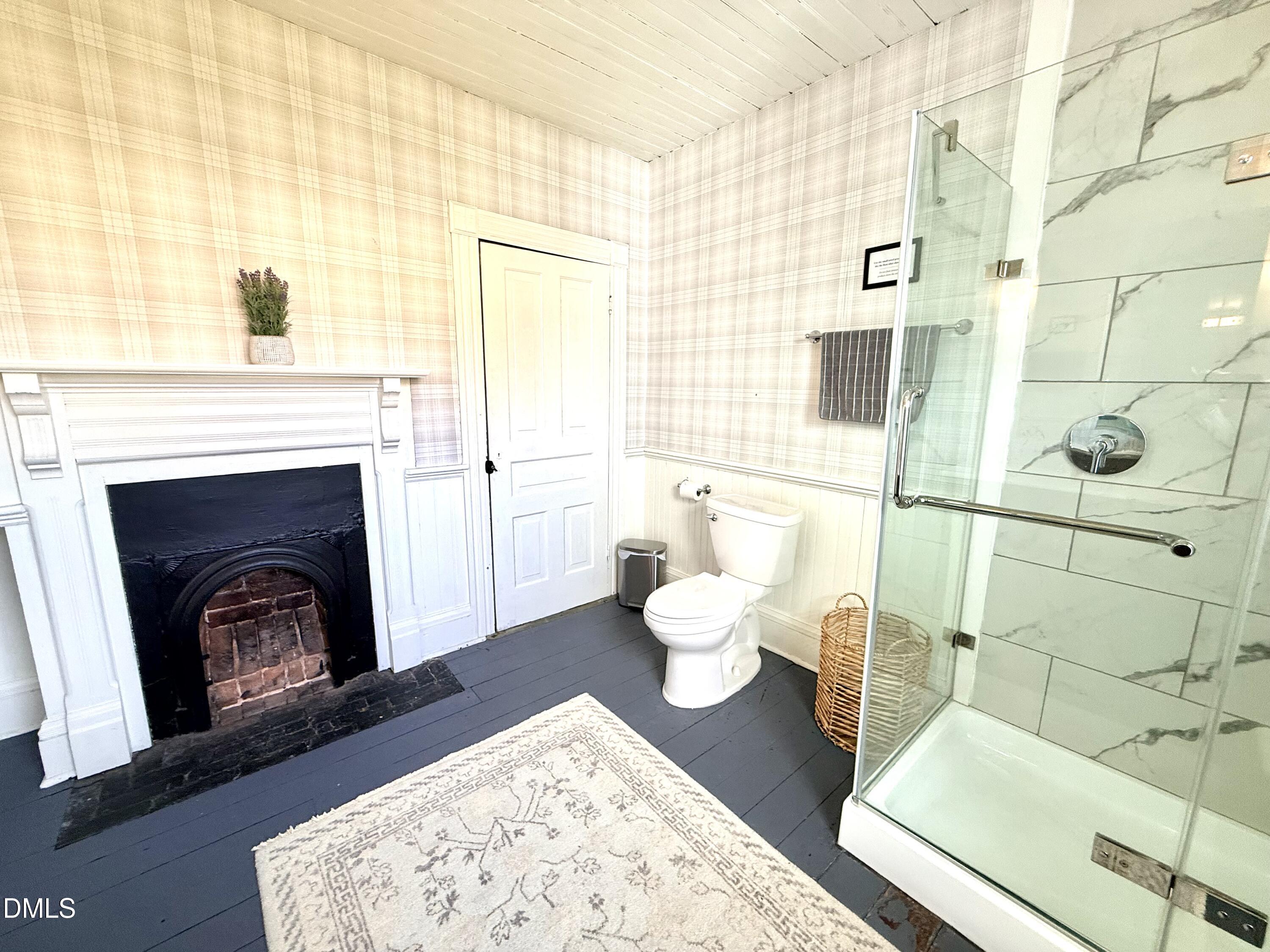 190 Broad Street Milton, NC 27305 - Photo 32 of 62 a spacious bathroom with a bathtub sink and toilet
