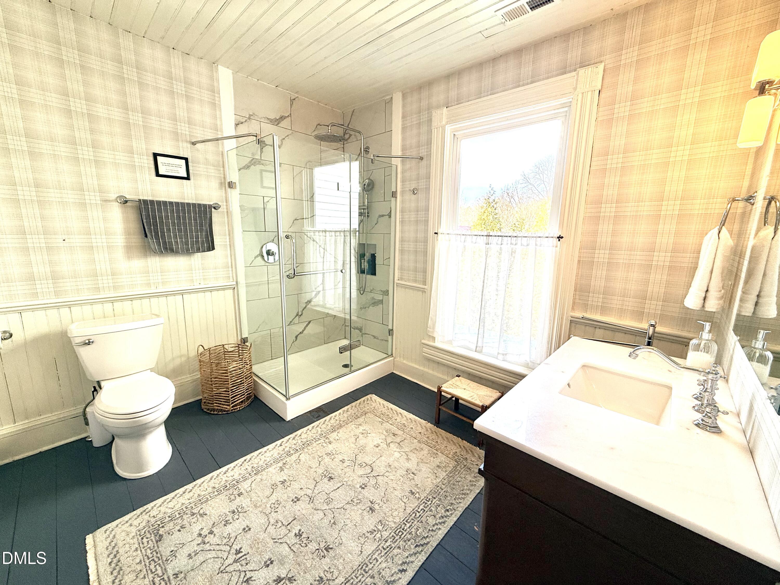 190 Broad Street Milton, NC 27305 - Photo 35 of 62 a bathroom with a sink toilet and shower