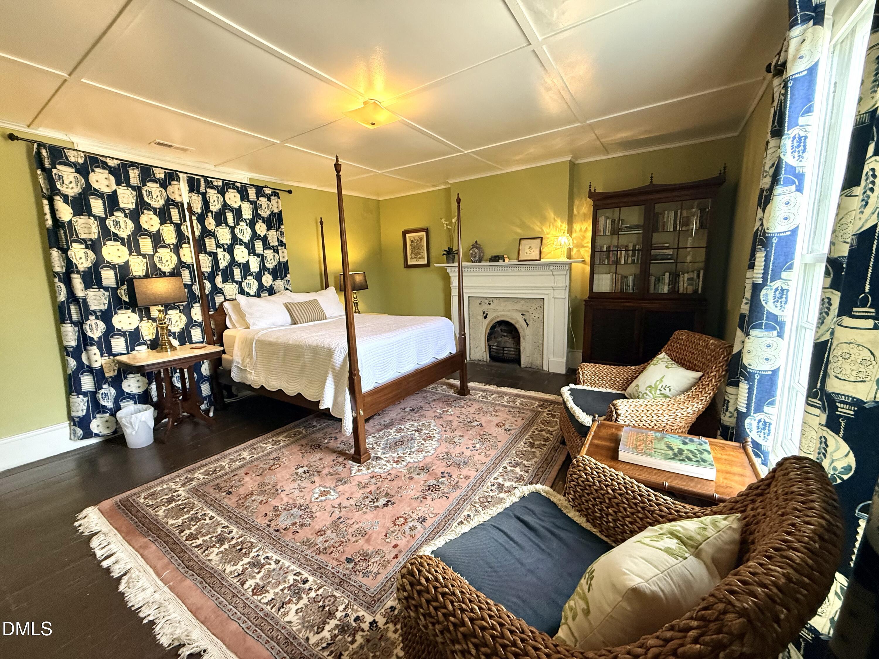 190 Broad Street Milton, NC 27305 - Photo 52 of 62 a bed room with a bed and a couch