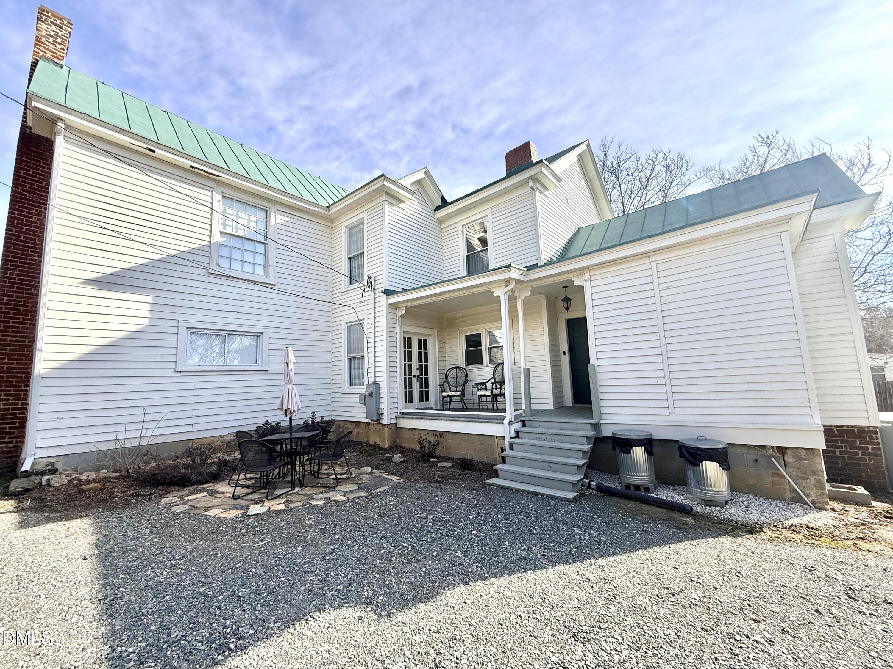 190 Broad Street Milton, NC 27305 - Photo 59 of 62 a front view of a house with garden