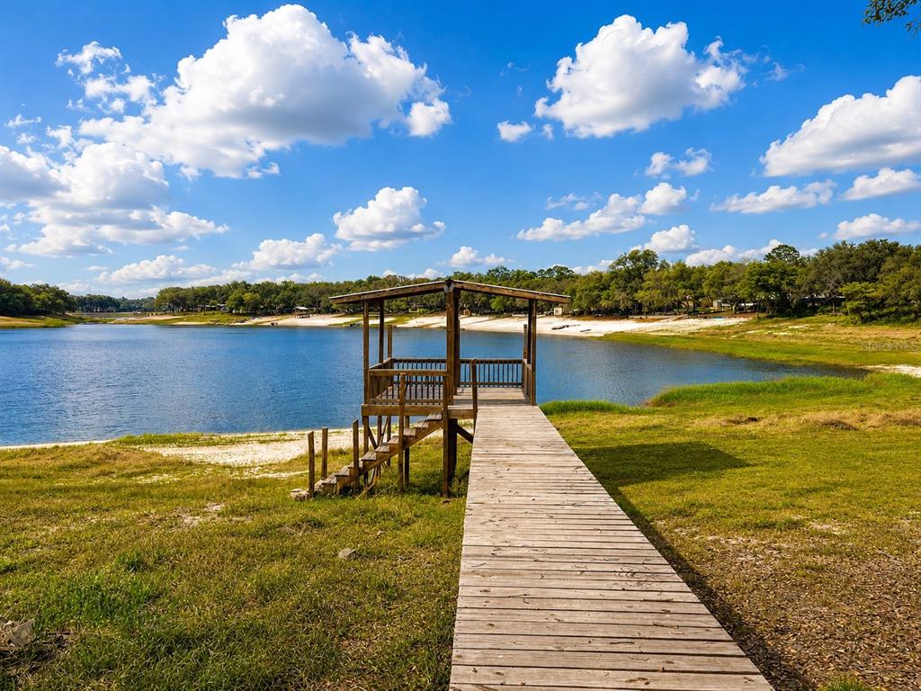 7119 Immokalee Road Keystone Heights, FL 32656 - Photo 3 of 50 a view of a lake with a table