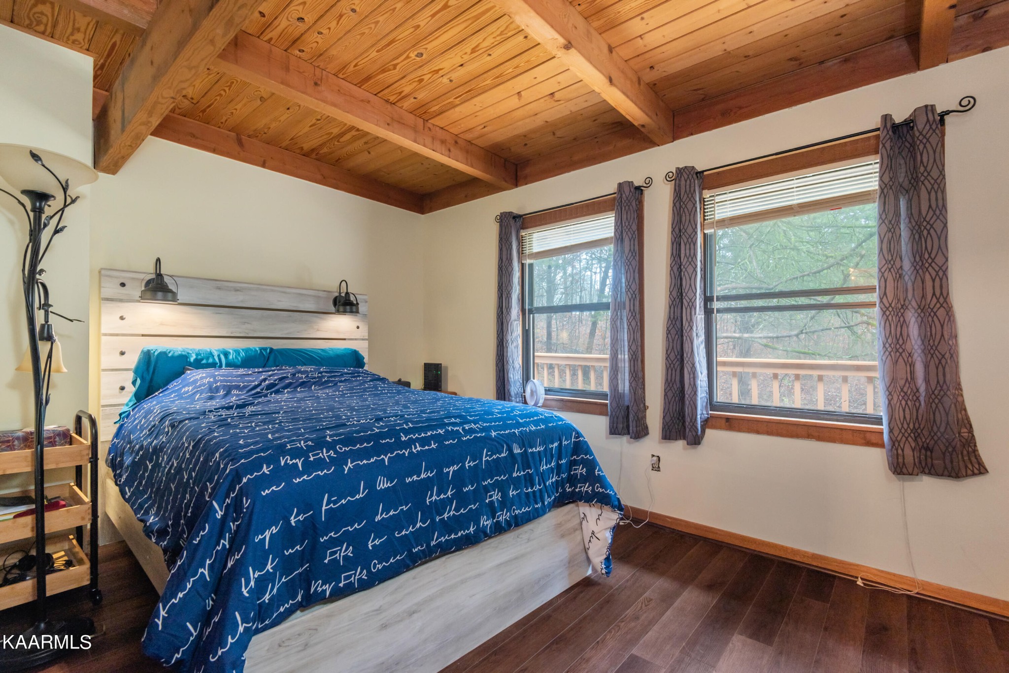 2356 Black Oak Ridge Road Sevierville, TN 37876 - Photo 21 of 33 a bedroom with a bed and wooden floor