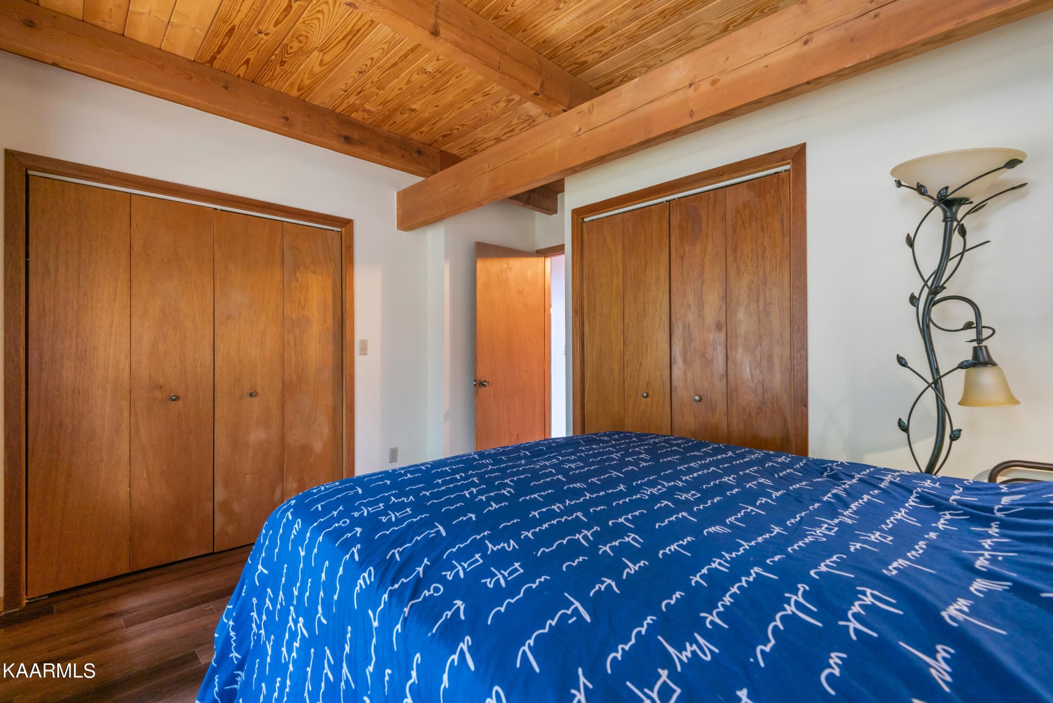 2356 Black Oak Ridge Road Sevierville, TN 37876 - Photo 22 of 33 a bedroom with a bed and a dresser