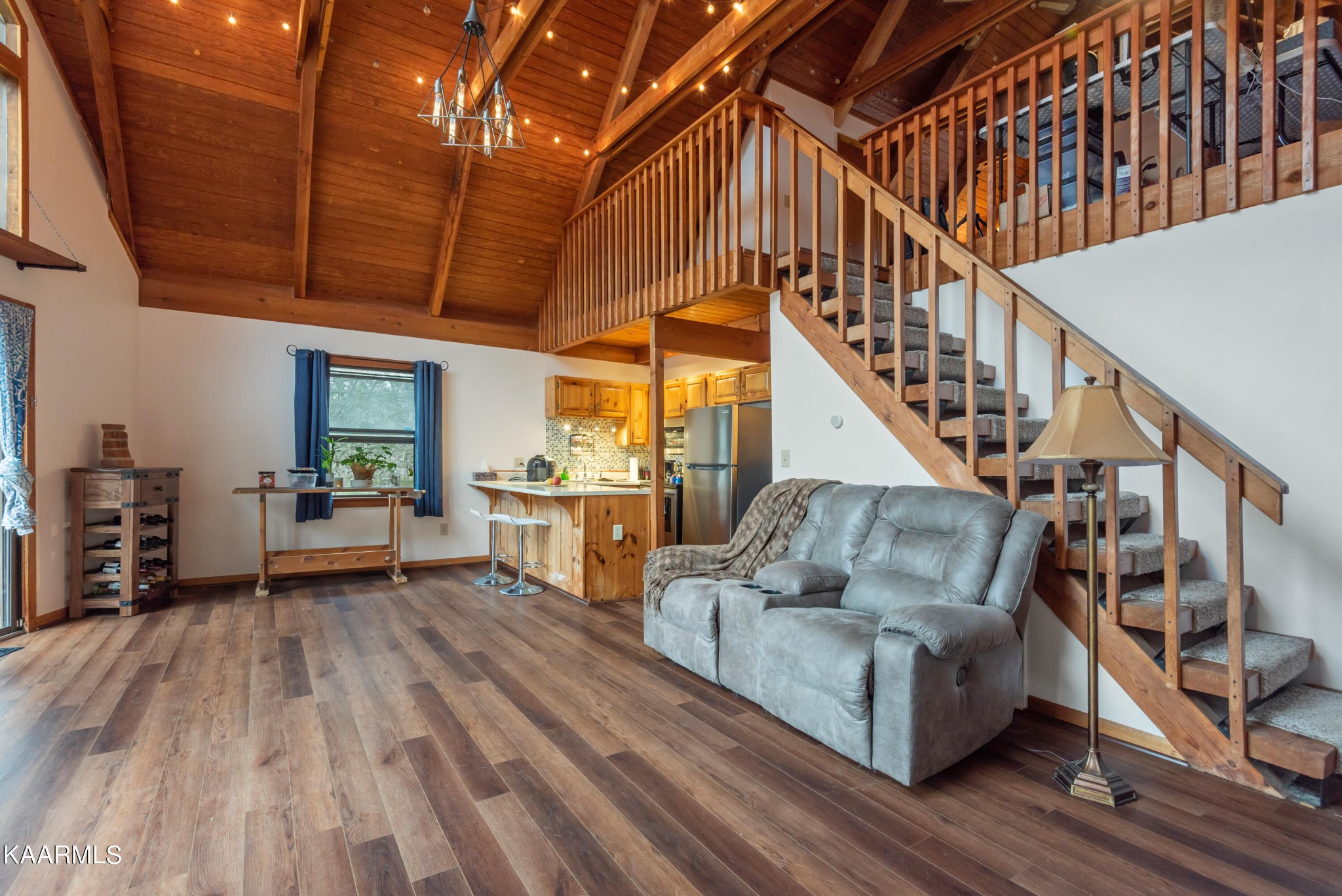 2356 Black Oak Ridge Road Sevierville, TN 37876 - Photo 25 of 33 a living room with furniture and wooden floors