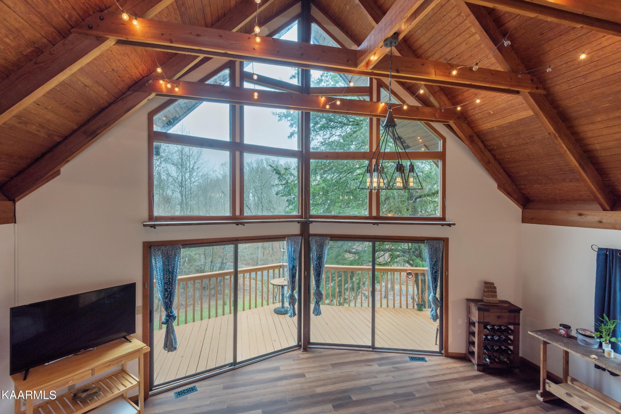 2356 Black Oak Ridge Road Sevierville, TN 37876 - Photo 6 of 33 a view of a room with wooden floor and windows